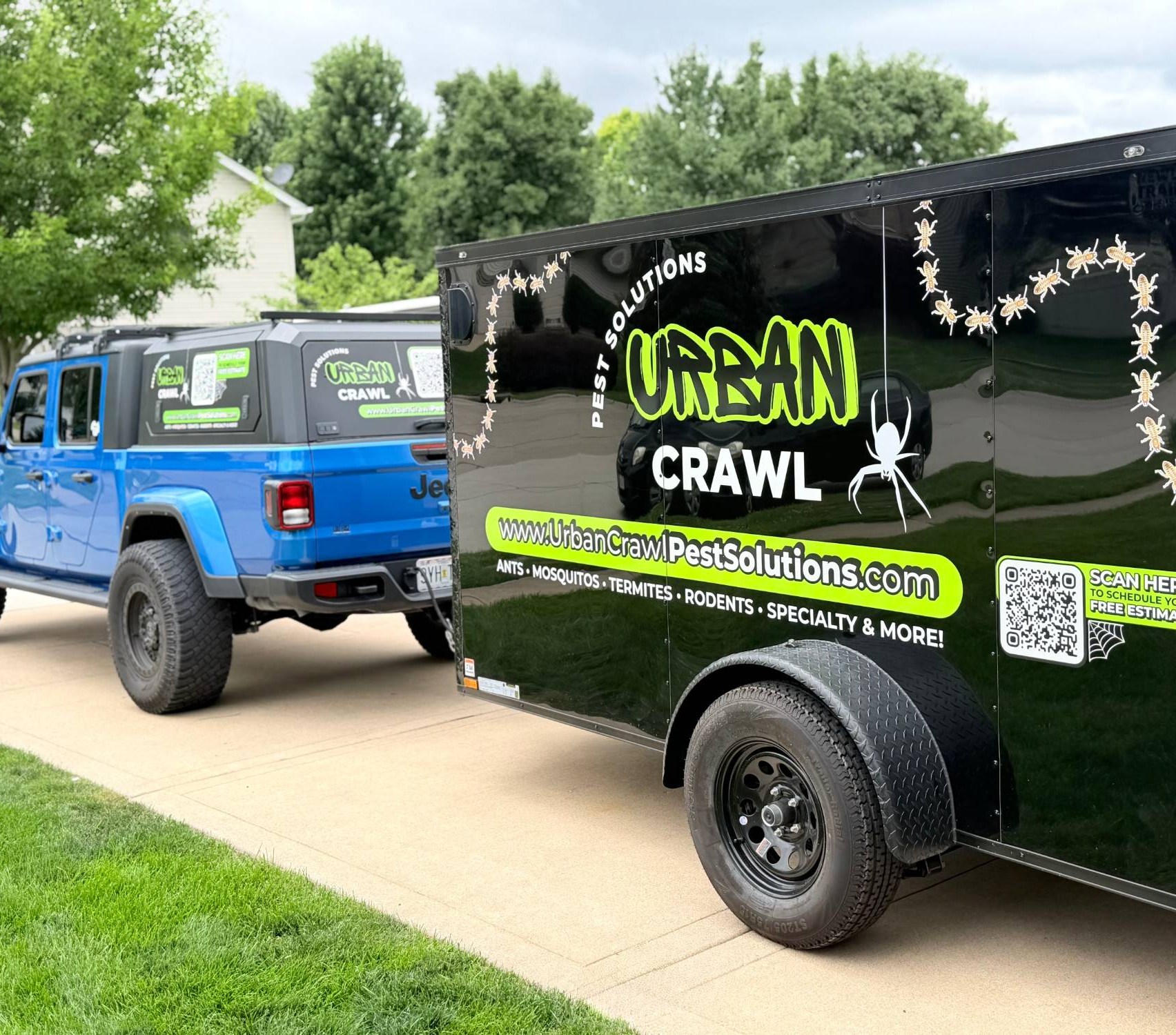 Urban Crawl Pest Solutions branded truck and trailer